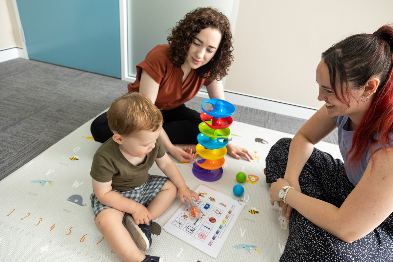 Parent and clinician in a session with child